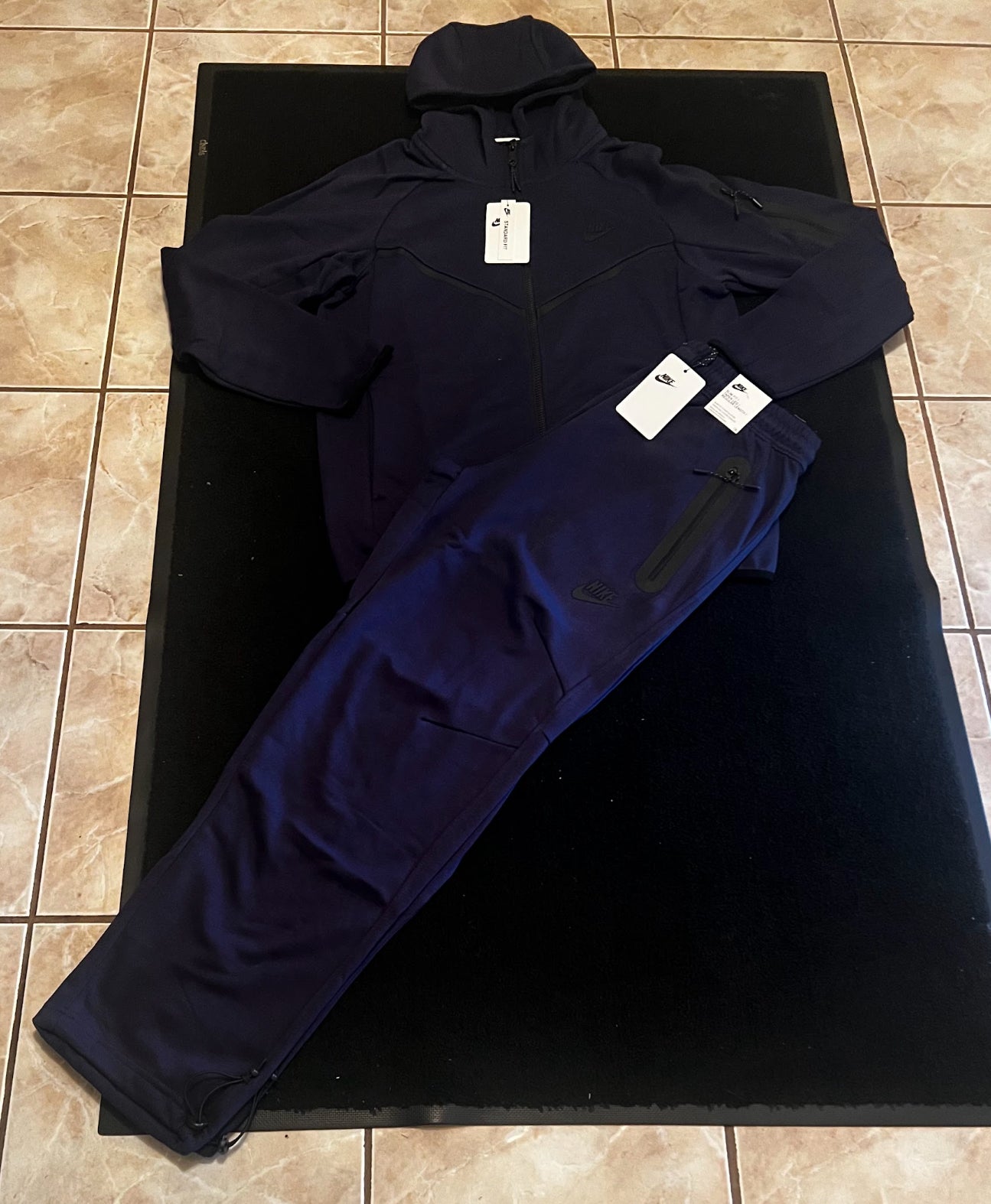 Dark Blue Nike Tech sweatpants and hoodie